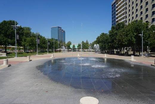 A plaza with a fountain in Richardson